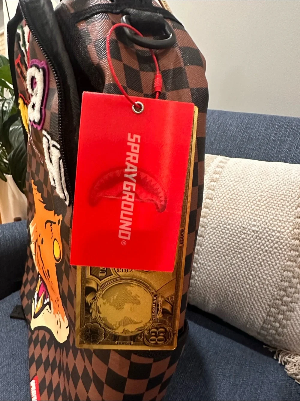 Sprayground Brown Checkerboard Backpack with Orange Tiger Patch
